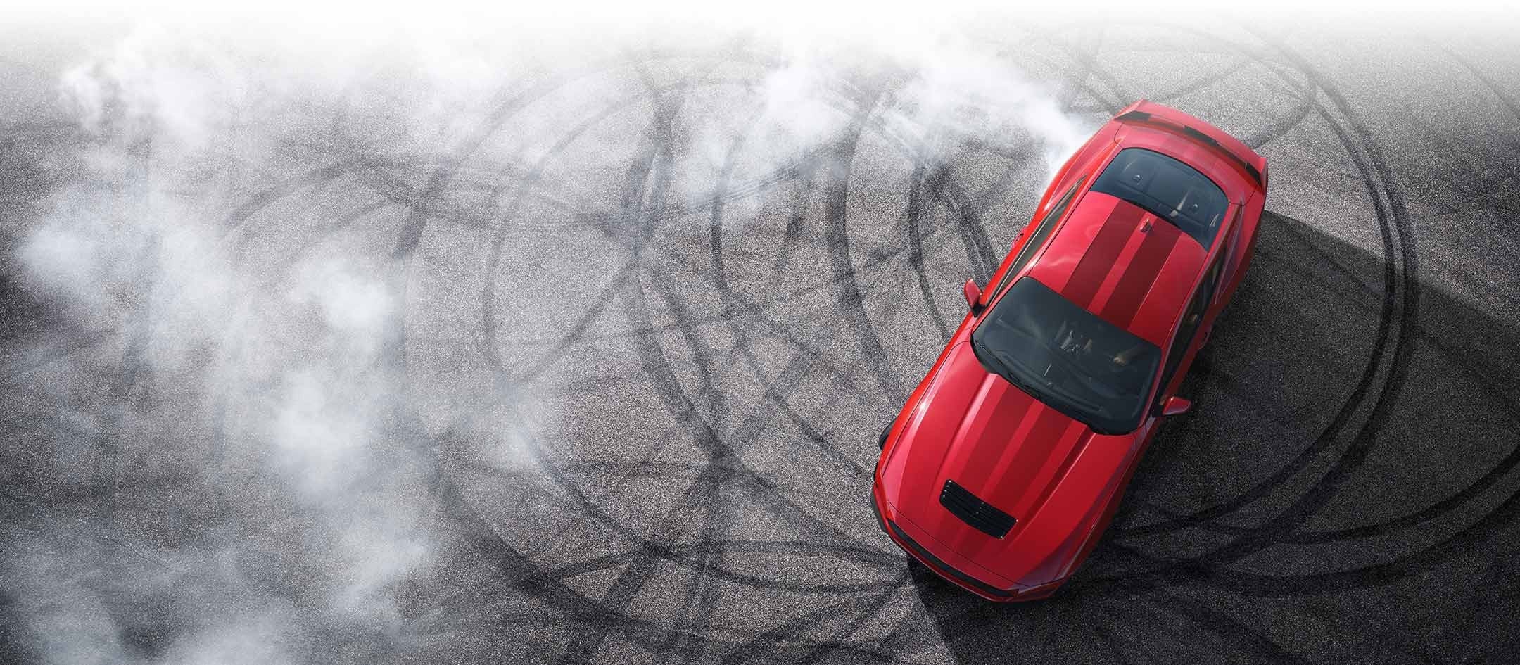 Overhead view of a 2024 Ford Mustang® model with tire tracks on pavement | Pierre Ford of Prosser in Prosser WA
